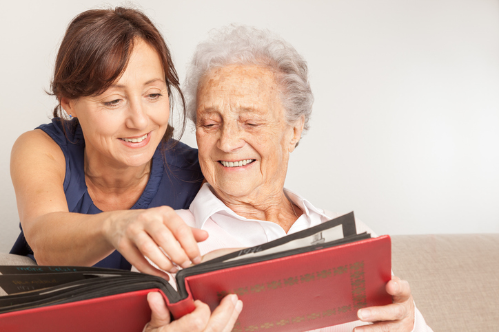 women looking at book